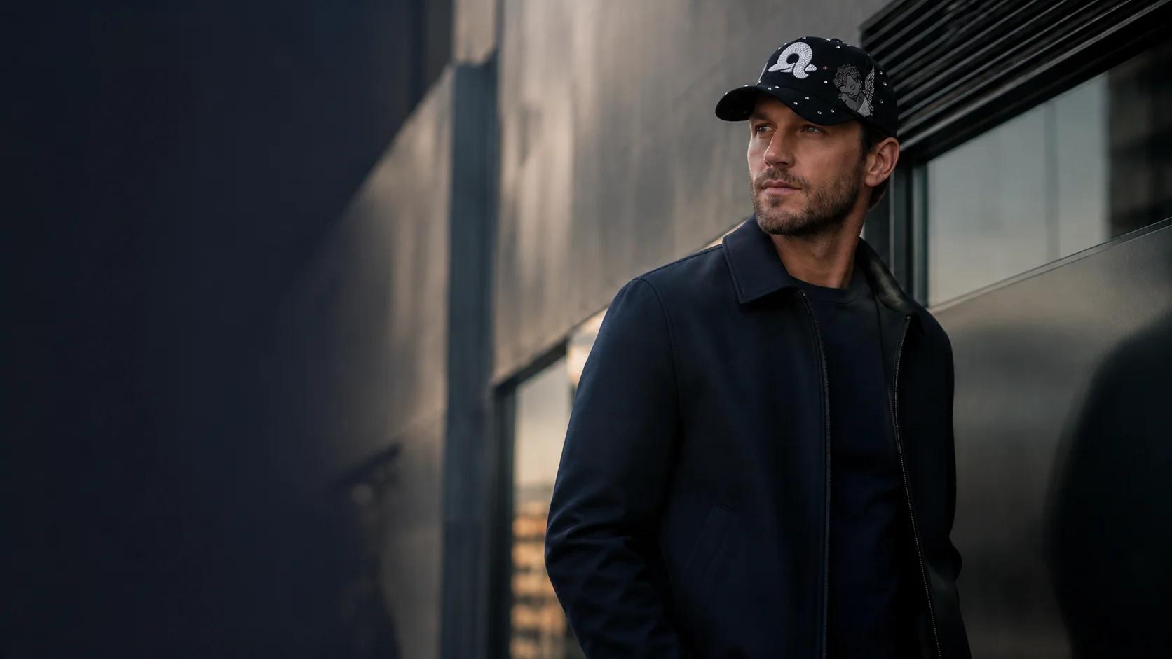 Man wearing custom QSHeadwear cap