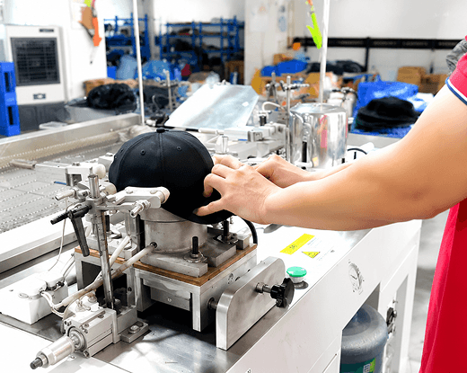Steam shaping and form inspection for hats